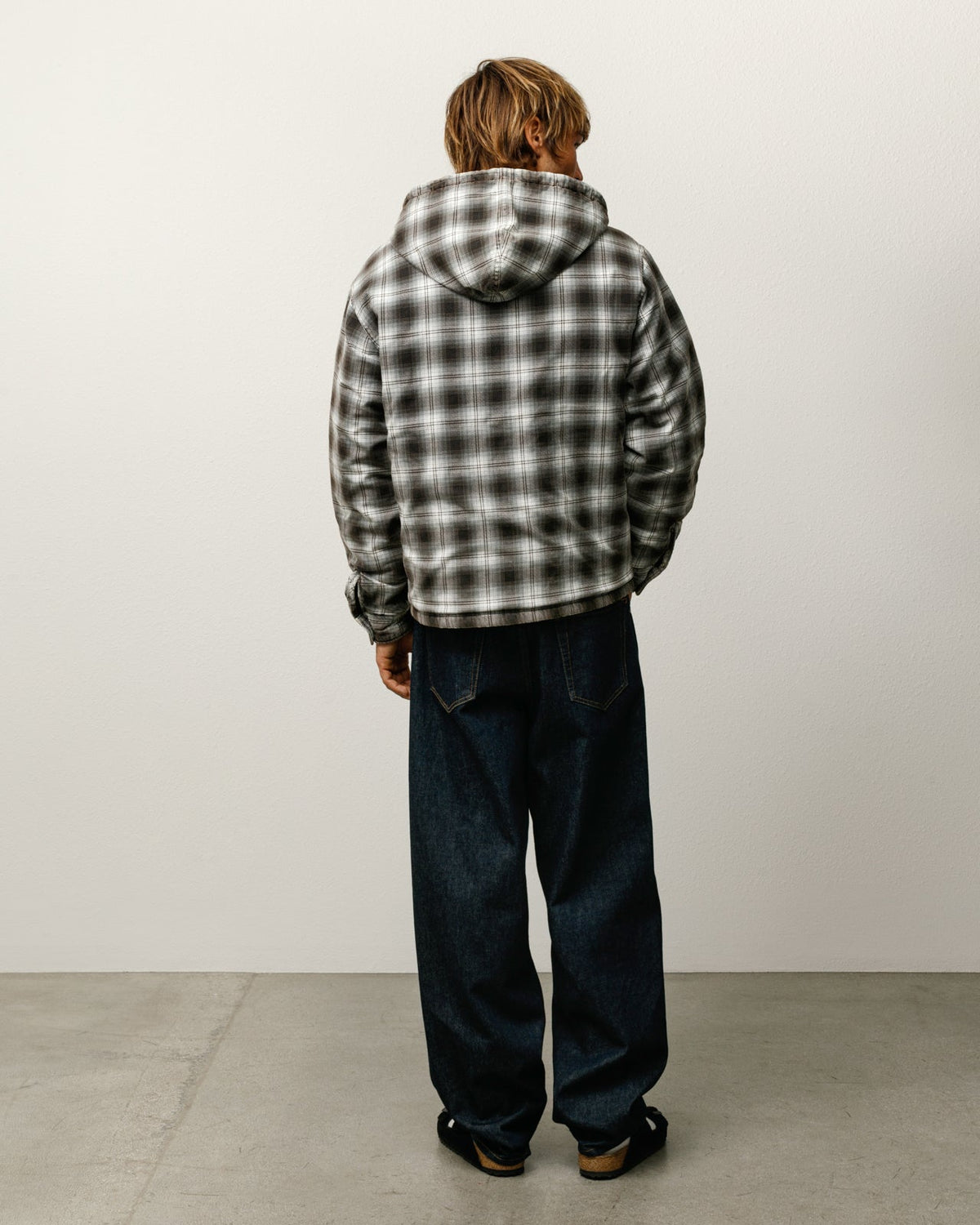 Stüssy Zip Hooded Plaid Shirt outerwear in the color Charcoal