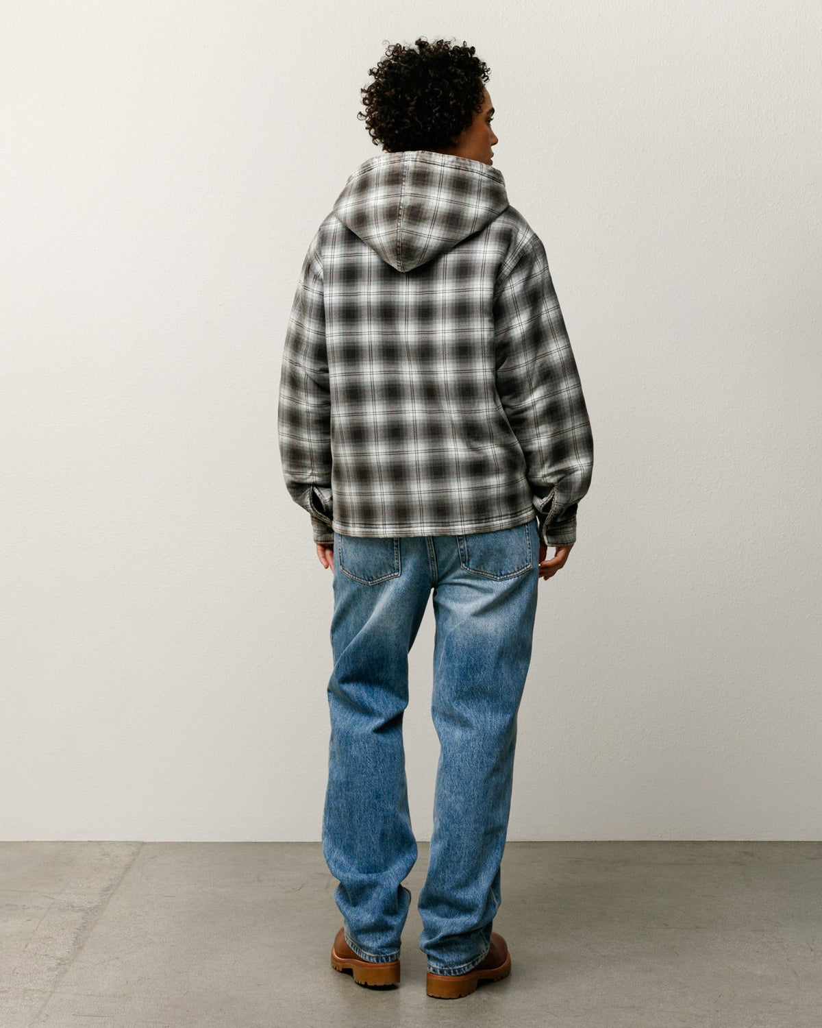 Zip Hooded Plaid Shirt outerwear in the color Charcoal, quilted lining and zip closure.