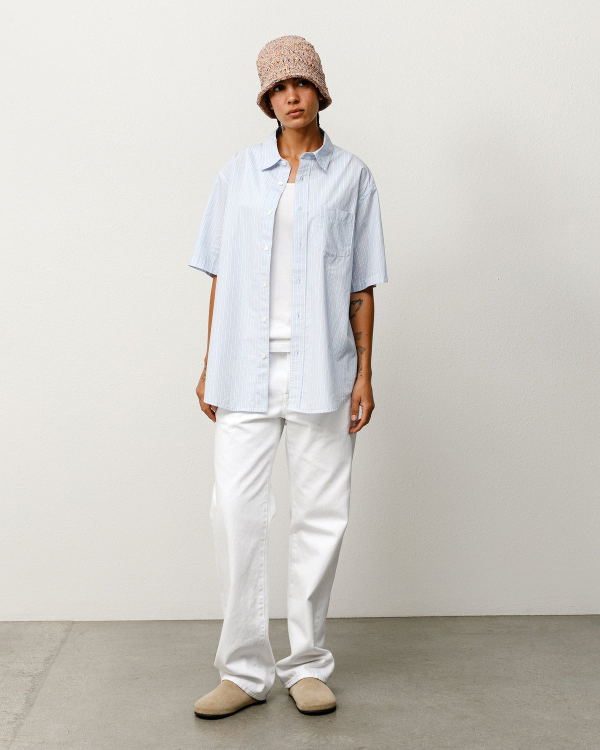 Stüssy Standard SS Shirt button-up in Blue Stripe cotton poplin, short-sleeve on-body view.