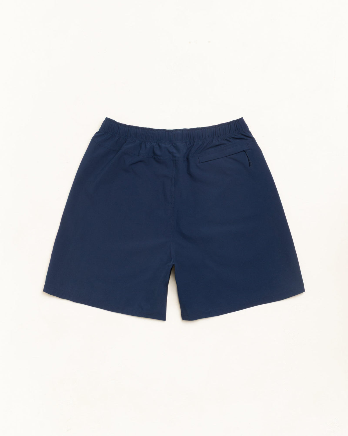Sport Short shorts in navy with elastic waist and back welt zip pocket, unisex