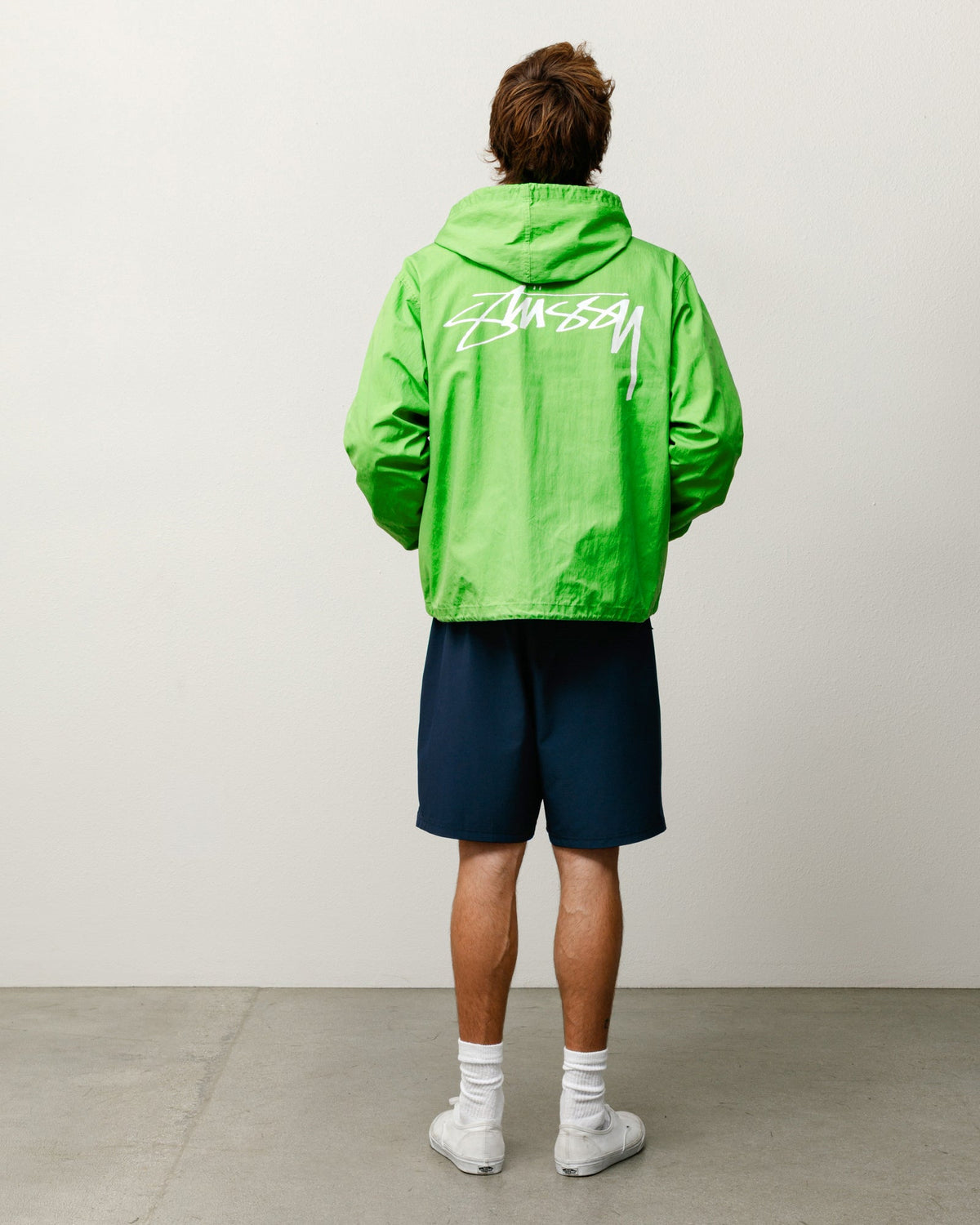 Sport Short shorts in navy, shown on-model from the back with elastic waist and relaxed fit