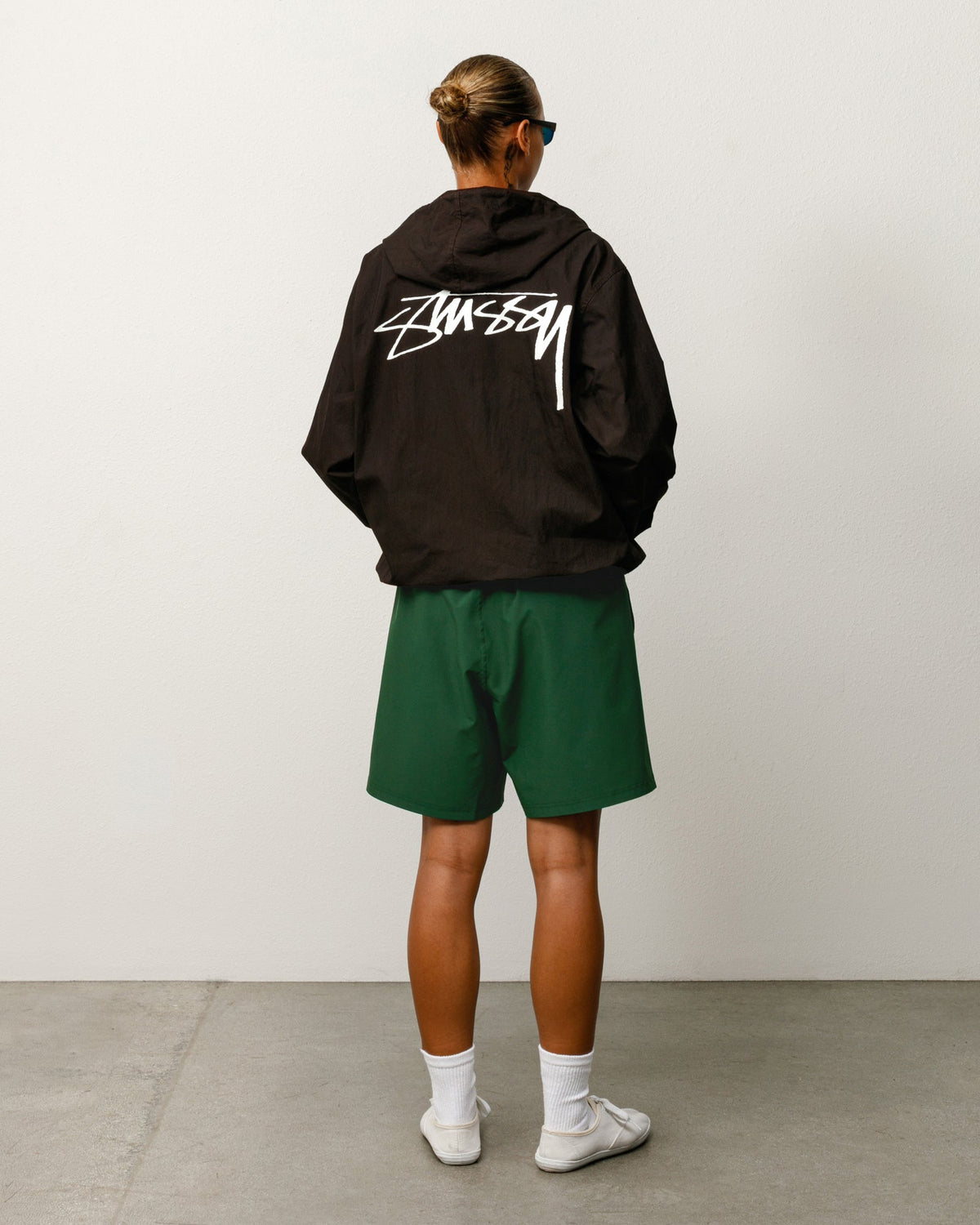 Unisex Sport Short in pine green, classic fit with elastic waist and side pockets.
