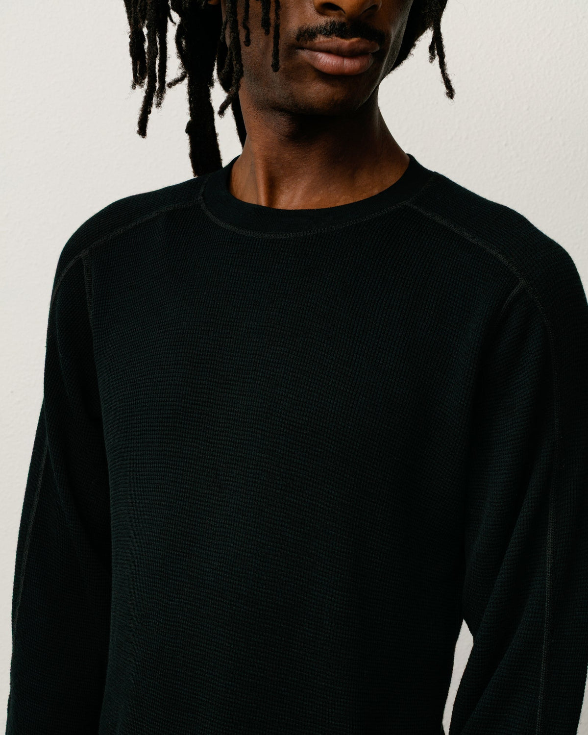 Wool LS Thermal knit in black, Stüssy long-sleeve waffle-knit wool top, back view