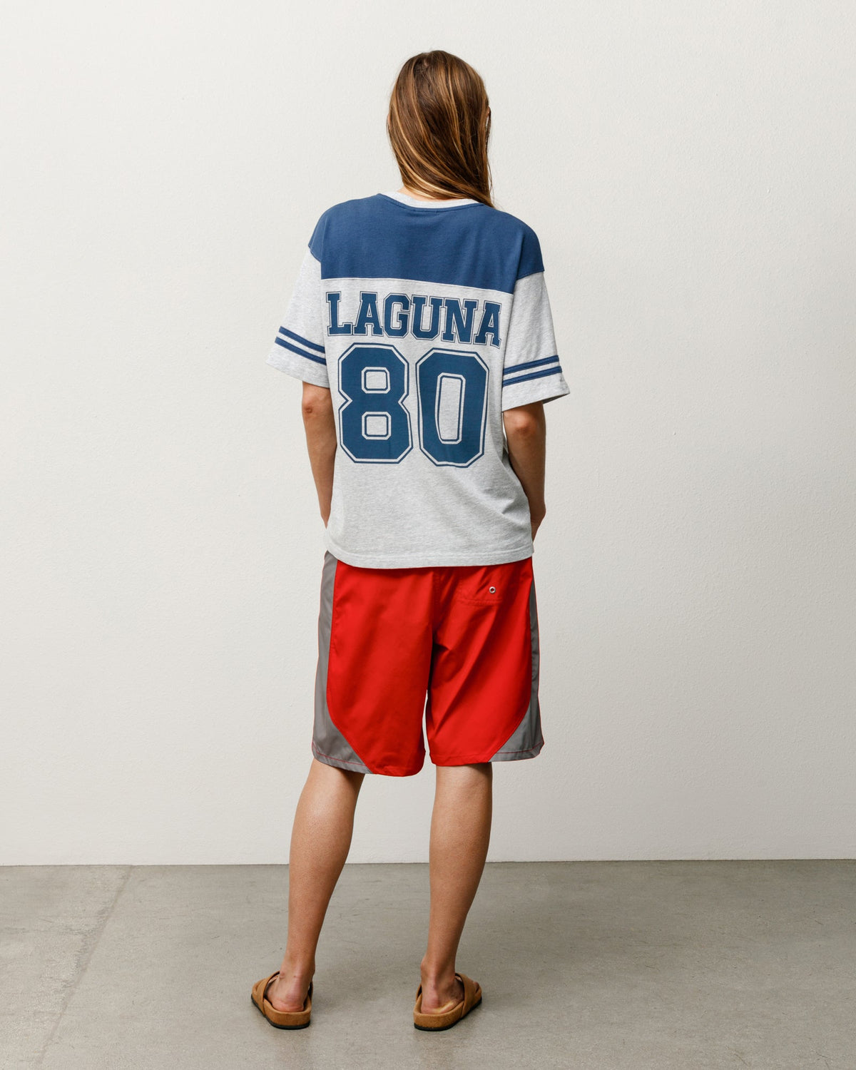 Stüssy Laguna 80 Jersey in the color Blue, stonewashed cotton, back view with bold LAGUNA 80 print.