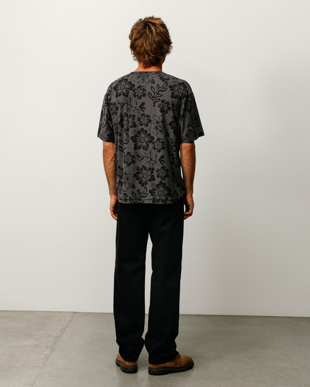 Stüssy Lazy Floral Tee unisex short-sleeve tee in Vintage Black