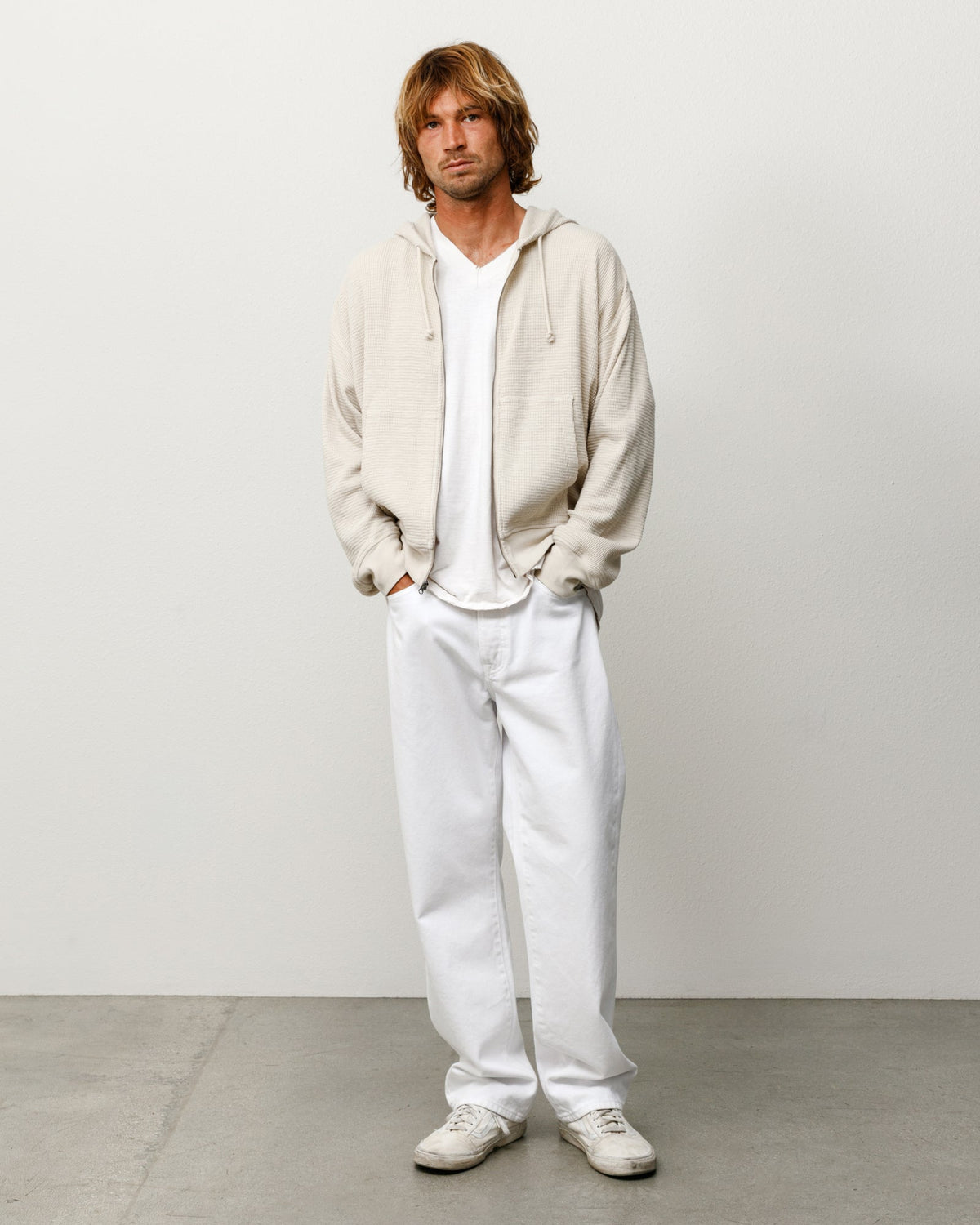 Stüssy Lightweight Thermal Hoodie in Bone, zip-front cotton waffle knit with kangaroo pocket.