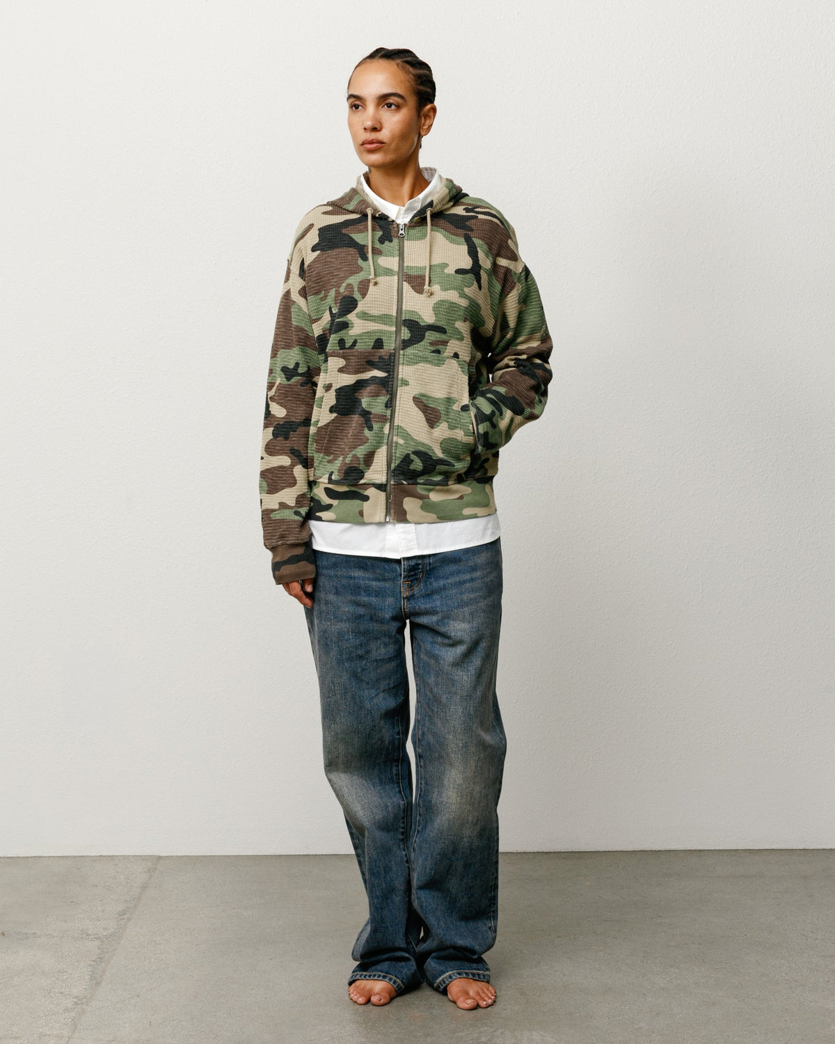 Lightweight Thermal Hoodie Zip Hood in Camo, cotton thermal with zip closure, ribbed cuffs and kangaroo pocket by Stüssy
