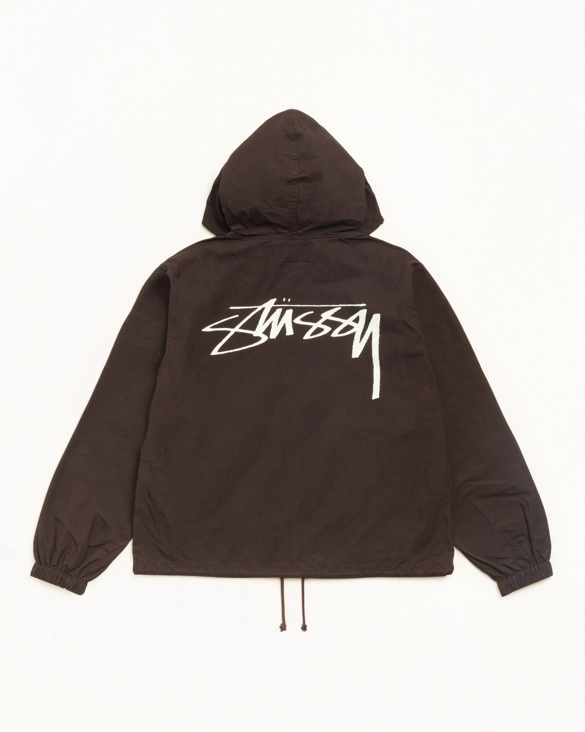 Waxed Cotton Beach Shell jacket in brown, relaxed fit with hood and large Stüssy back logo