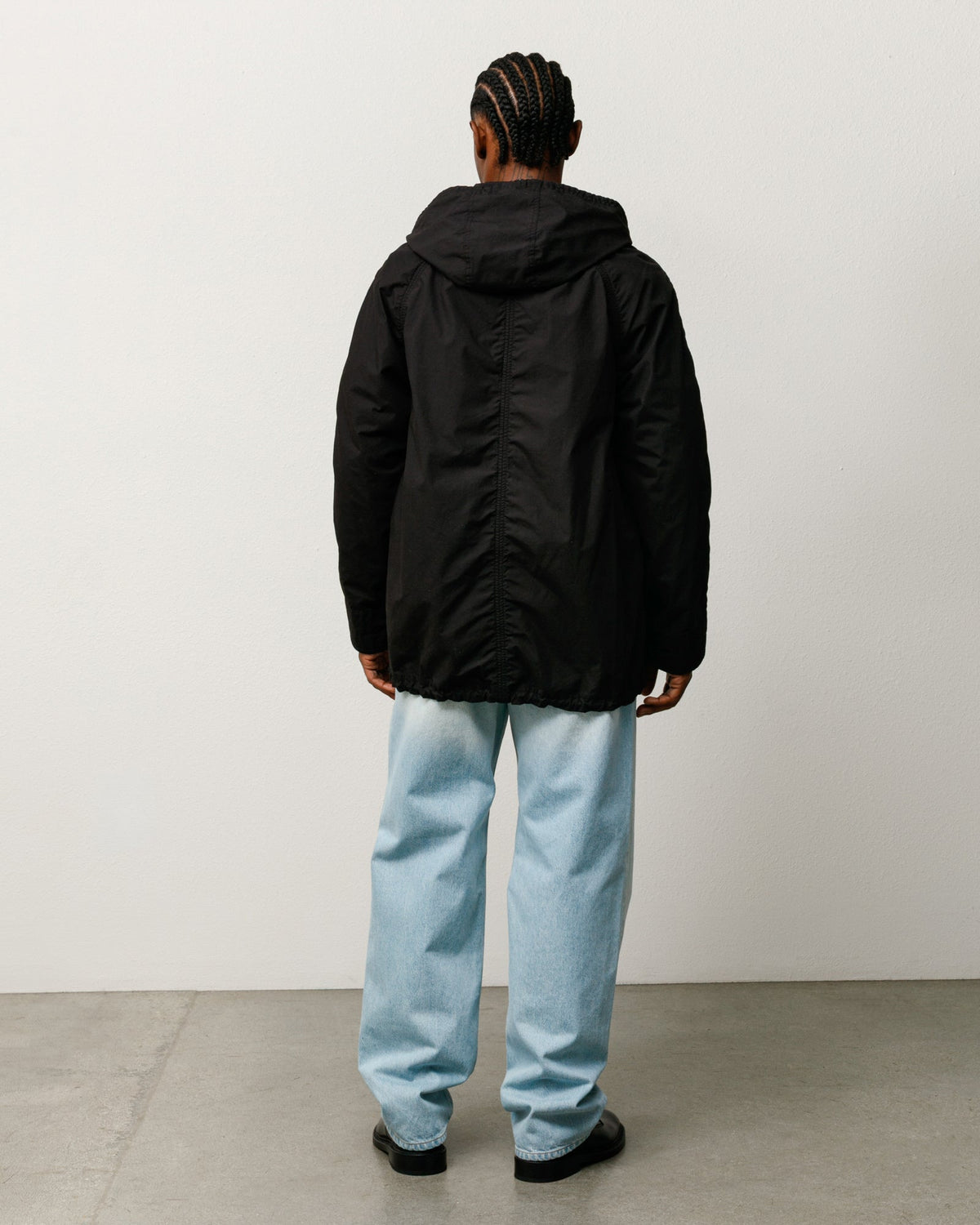 Stüssy lightweight long coat, unisex long-sleeve, in black.