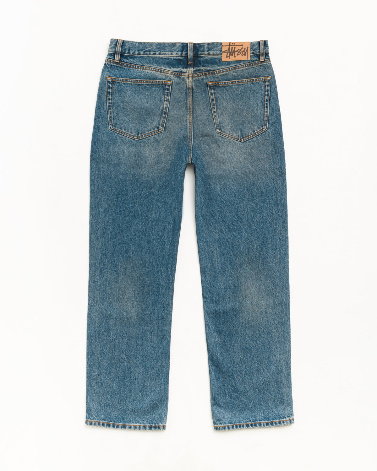 New Classic Jean Denim in Dark Wash Indigo, straight-leg 100% cotton with Stüssy suede back patch