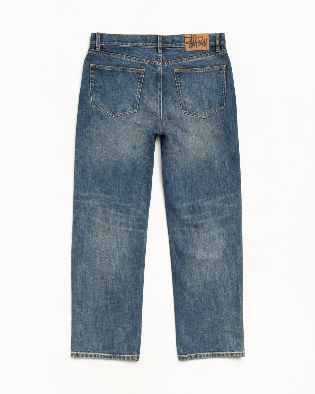 New Classic Jean Slub Denim in Blue, back view with suede Stüssy logo patch and straight leg