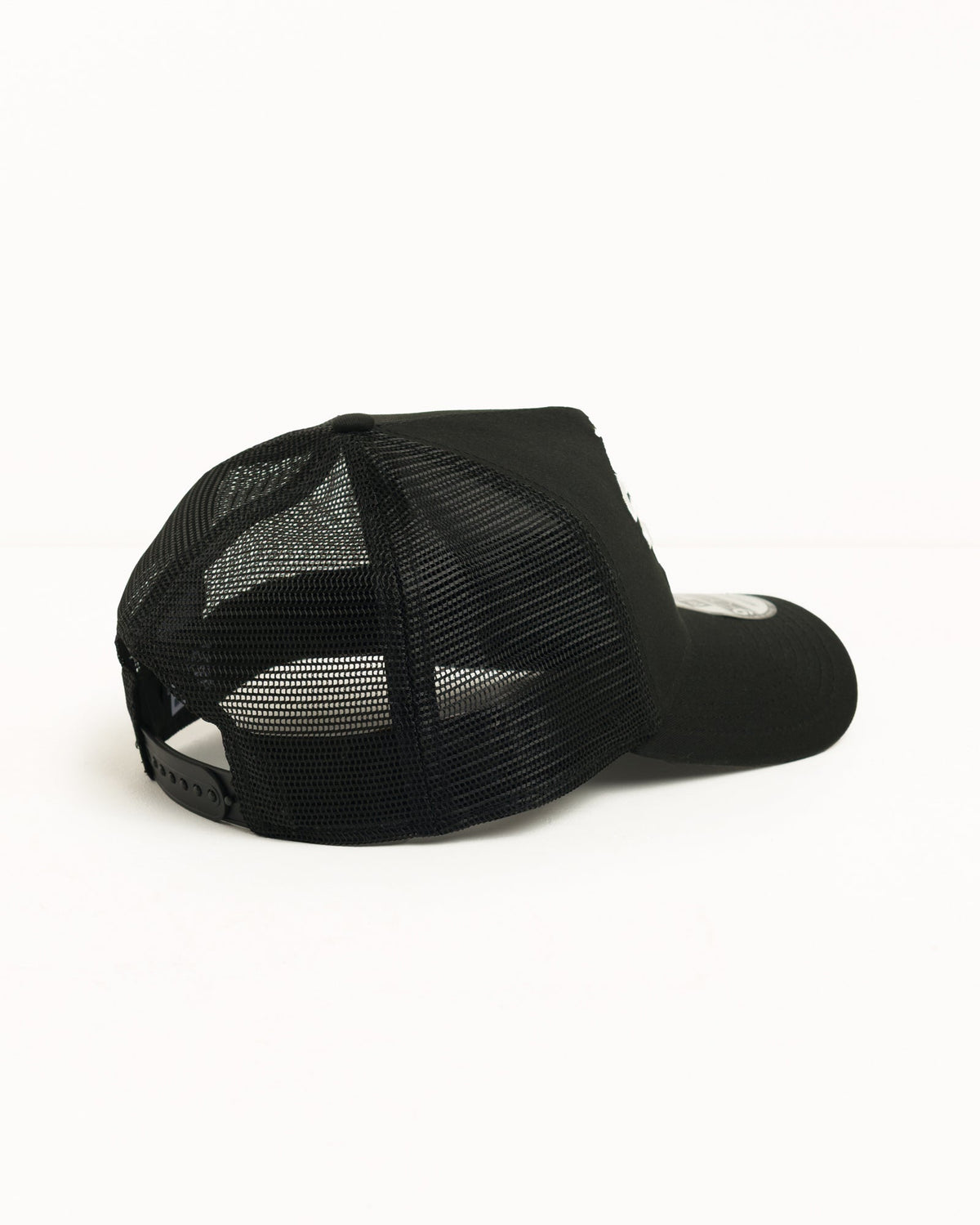 Stüssy Sport 9FORTY trucker cap, unisex, in black cotton twill with mesh panels