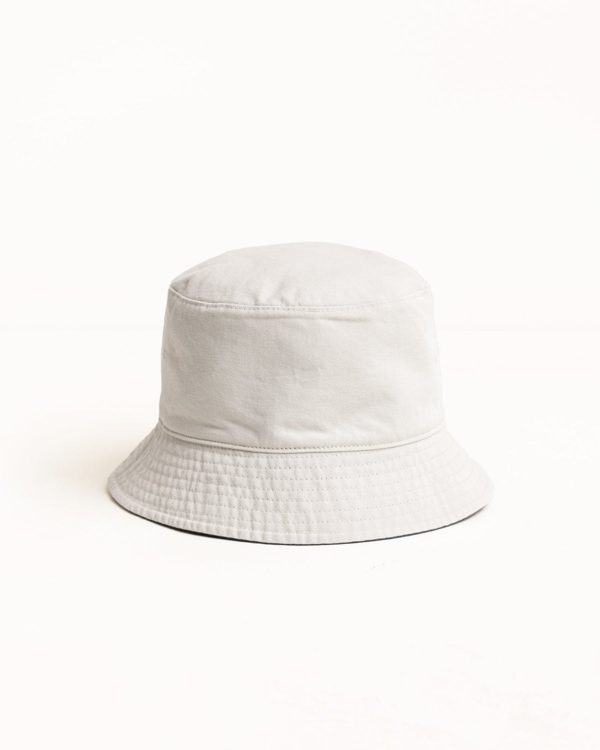 Stüssy Reversible Stock Bucket Hat bucket hat in Navy/Stone