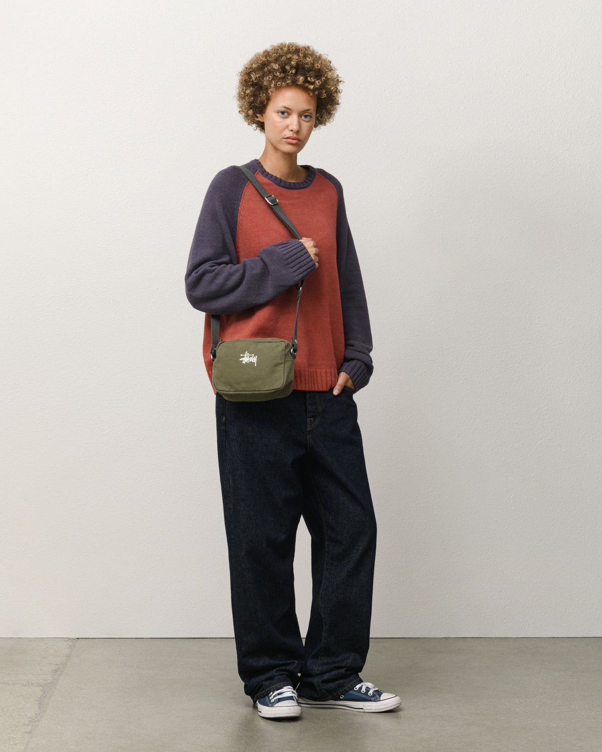 Stüssy CANVAS POUCH accessories in green cotton canvas with adjustable crossbody strap and logo.